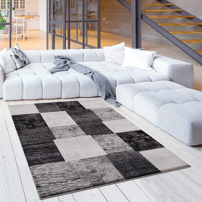 Tapis de couloir gris à blocs géométriques