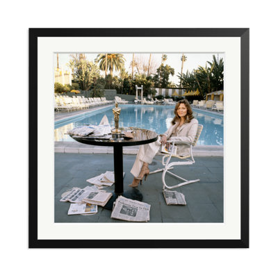Faye Dunaway Sits By The Pool
