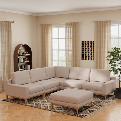 Canapé modulaire rembourré en V avec repose-pieds 6 pièces Bourbeau