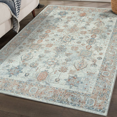Tapis à motif géométrique ivoire Lussi