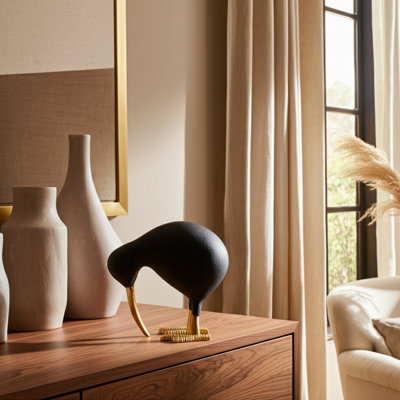 Metal Aluminum Kiwi Bird Figurine in Modern Sculptural Form with Curved Beak and Rounded Body for Contemporary Decorative Accent Display Shelf or Tabletop Art Object Statue