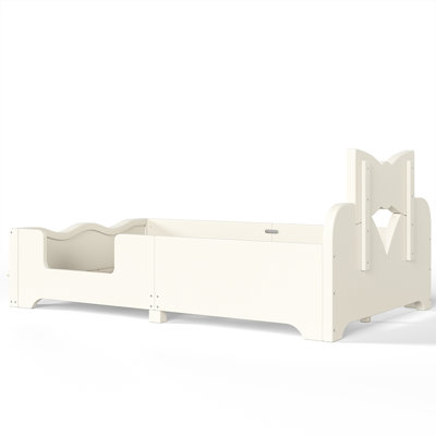 Twin Size Kids Platform Bed with Full Surround Guardrails, Cute Bowknot Shaped Headboard & Built-in Side Bookshelf, Natural Wood Finish Floor Bed, No Box Spring Needed and low profile design. Beige