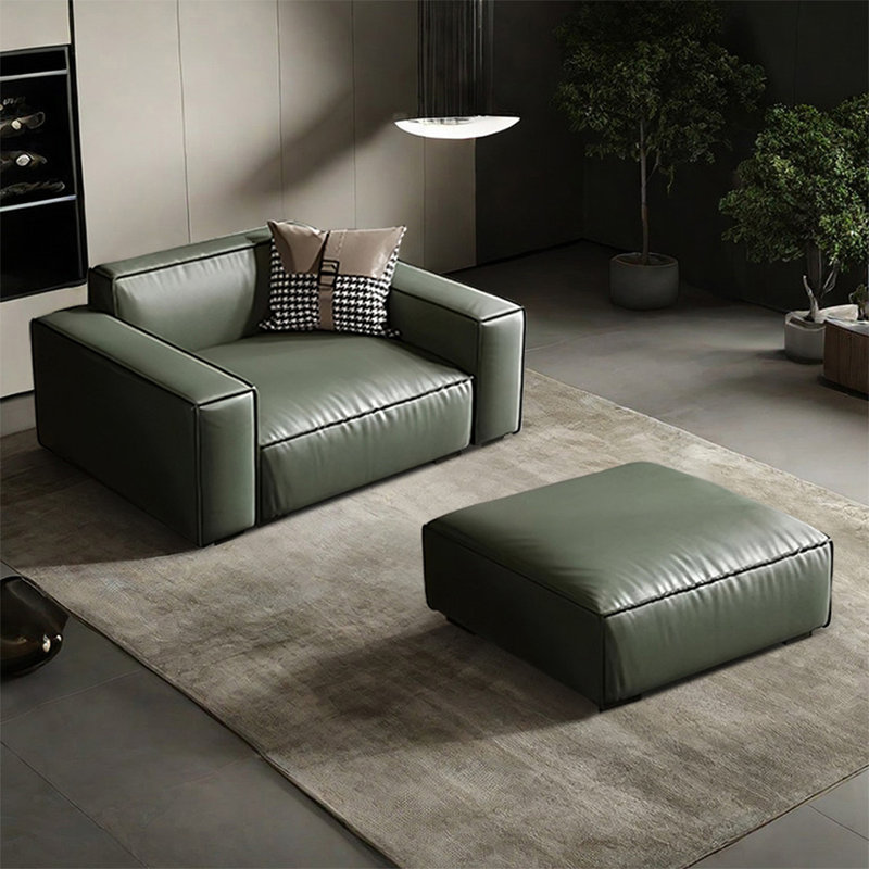 Chaise avec accoudoirs avec coussin vert en cuir véritable avec repose-pieds