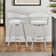 Robinett Swivel Counter or Bar Height Bar Stool with Arms and Footrest in Faux Leather and Metal