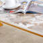 La table basse est fabriquée en dalle de roche, avec un motif de marbre lisse sur la surface-771705494