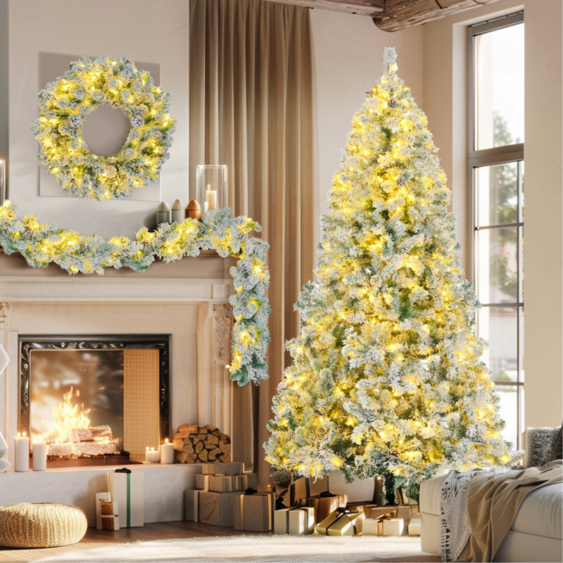 Arbre de Noël enneigé 6 pi, ensemble illuminé avec arbre, guirlande et couronne, arbre de Noël articulé artificiel avec lumières DEL colorées, 8 modes d'éclairage, pommes de pin, décoration des Fêtes pour la maison