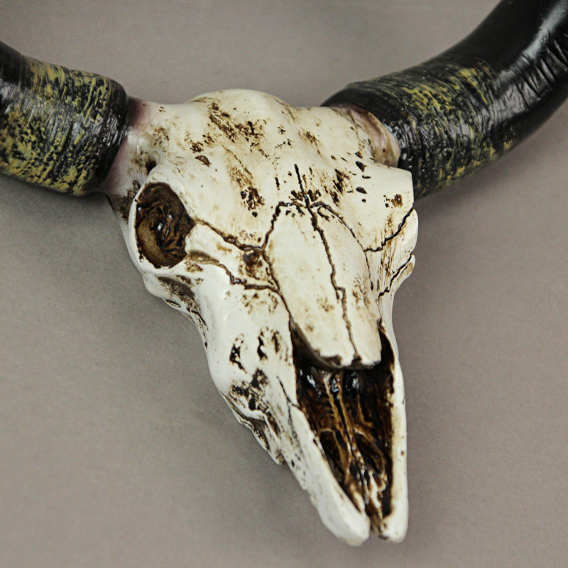 Southwestern hand-painted black resin steer skull wall mount toilet paper holder with plastic and metal roller — 7.25" W x 4.5" D x 7.75" H