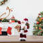 Figurine de père Noël avec sac-cadeau-22243930