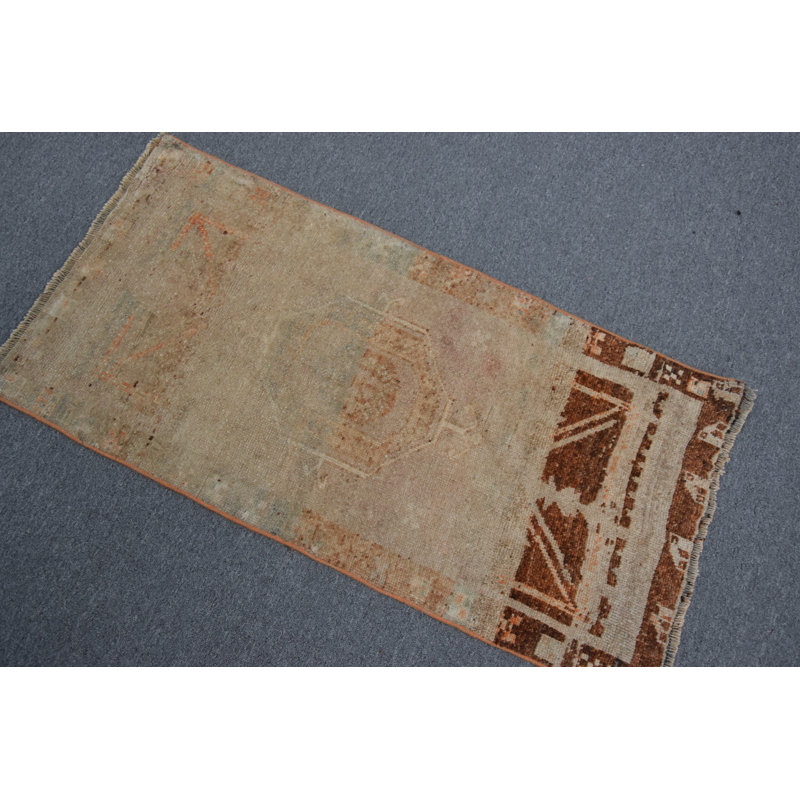 Handwoven Vintage Turkish Rug in Faded with Beige Highlights and Intricate Geometric Designs