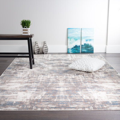 Tapis abstrait beige / gris