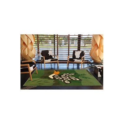 Tapis vert à motif d'oiseaux
