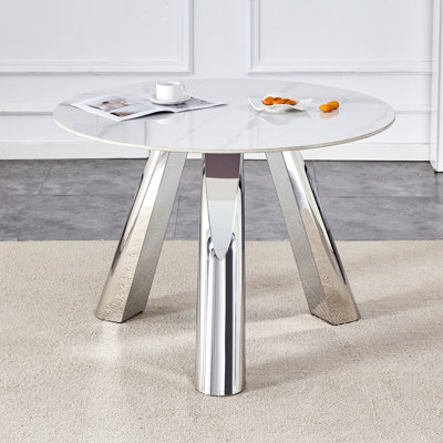 A 42-Inch Stainless Steel Leg Round Table With A Marble Top Is Suitable For Use By 4-6People