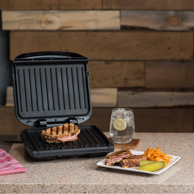George Foreman 4-Serving Removable Plate Electric Grill And Panini Press, George Tough Non-Stick Coating, Drip Tray Catches Grease, Black