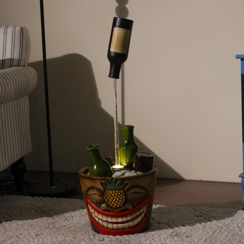 Fontaine fantaisiste avec masque Tiki
