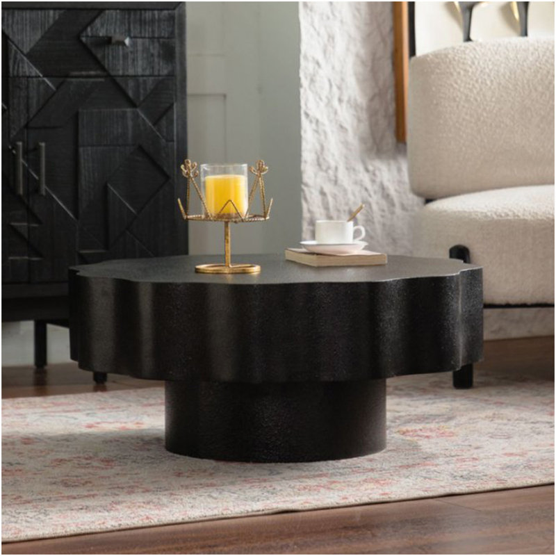 Table basse festonnée noire: forme unique à bord ondulé, pièce centrale élégante pour les espaces élégants.