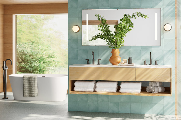 organic modern bathroom with pale blue tile, floating wood vanity, and two globe-shaped wall sconces