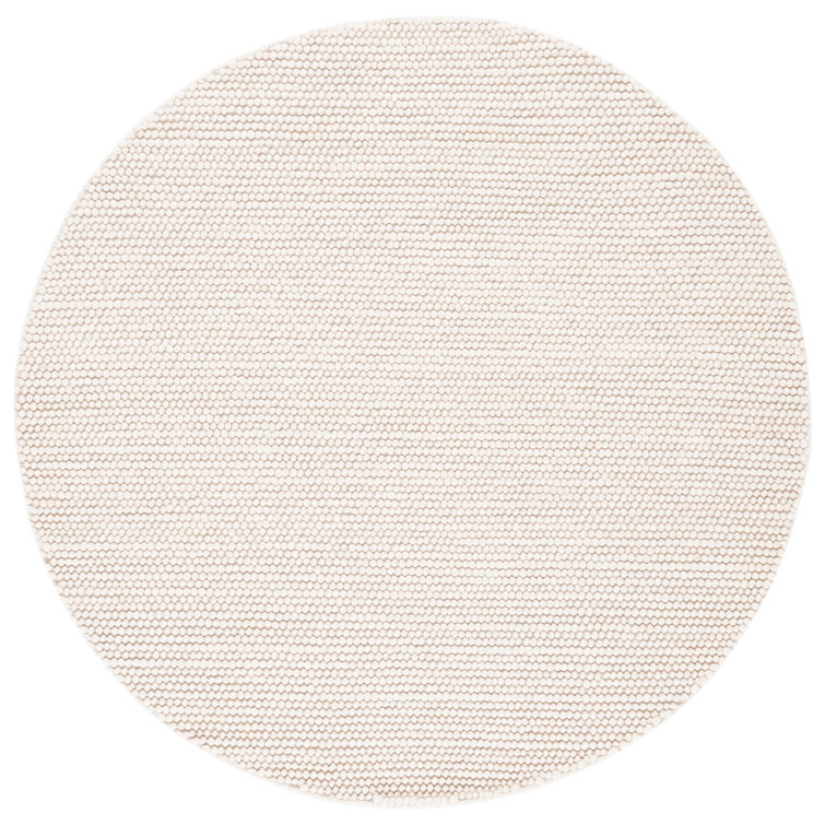 Charvik Solid Color Handmade Area Rug in Ivory