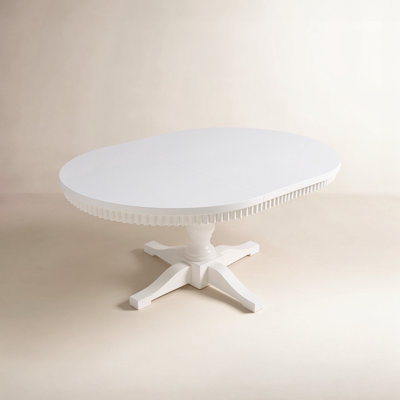 Gunes Modern Farmhouse 66" Round-To-Oval Pedestal Dining Table - White