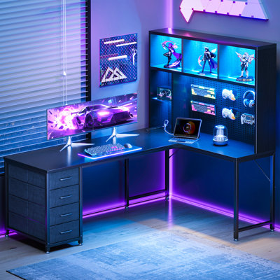 Bureau en L avec huche, bureau de jeu avec panneau perforé, bureau à domicile avec 4 tiroirs en tissu, bureau réversible avec lumières DEL et prises de courant