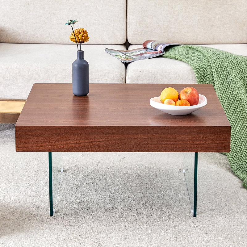 Table basse avec pieds en verre trempé