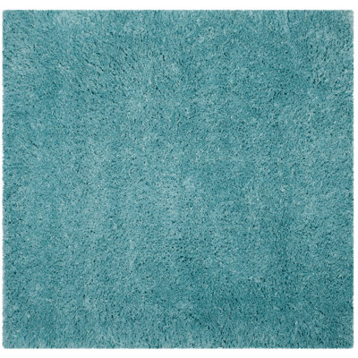 Hermina Light Turquoise Area Rug