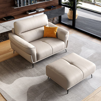 Chaise avec accoudoirs à coussin en cuir véritable blanc crème avec repose-pieds