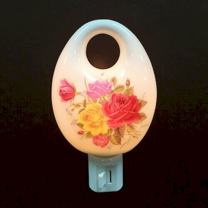 Fleurs assorties Nalany sur une veilleuse ovale