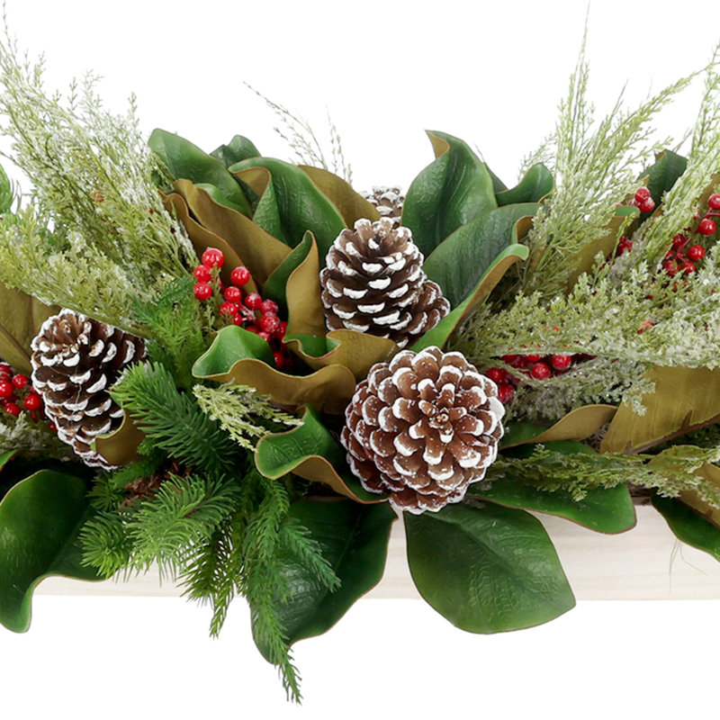 Holiday Arrangement with Wintry Greens, Magnolia Leaves and Berries