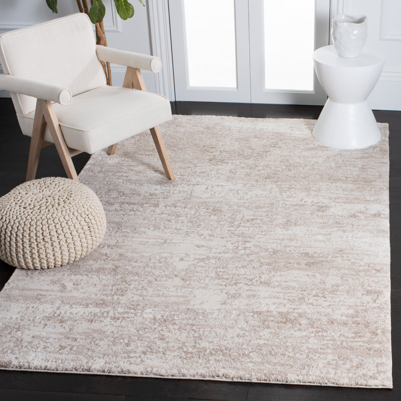 Tapis ivoire / beige rectangulaire en polypropylène tissé à la machine 6 pi 7 po x 9 pi