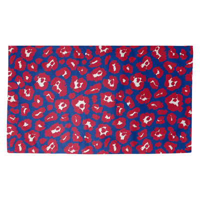Tapis bleu / rouge à imprimé animal