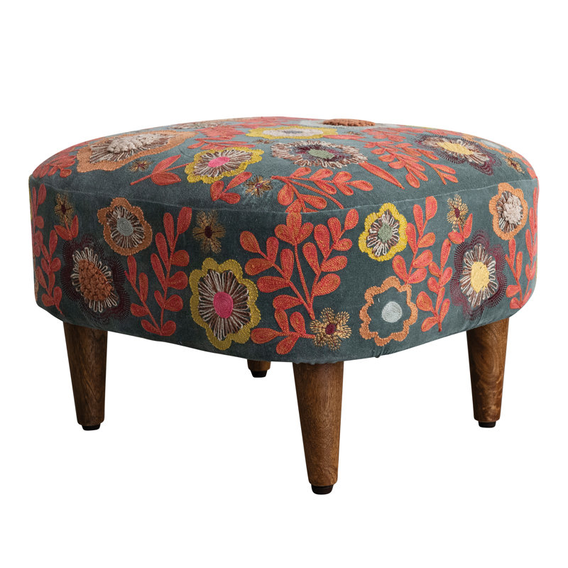 Tabouret en bois avec coussin en mousse
