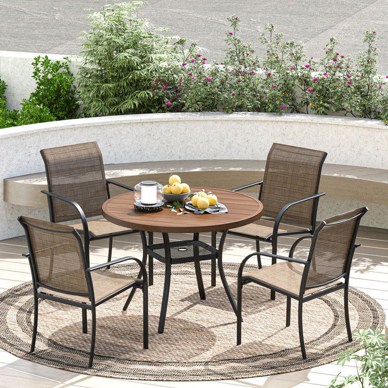 Eilardt 4 - Person Metal Patio Dining Set with Round Table