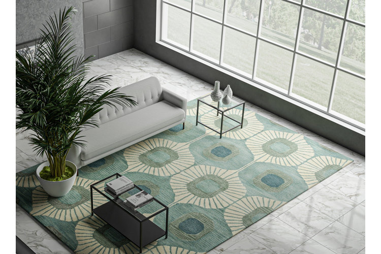 blue and green geometric area rug in a modern living room
