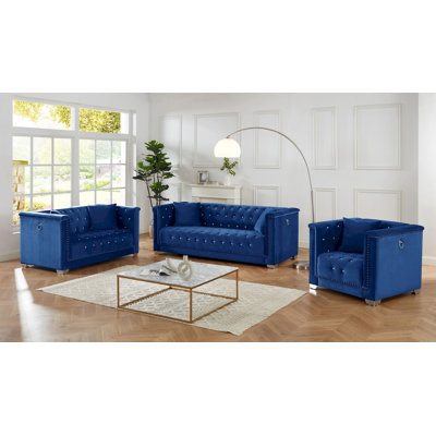 Causeuse capitonnée en velours bleu