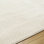 Tapis crème en polyester tissé à la machine Caireann