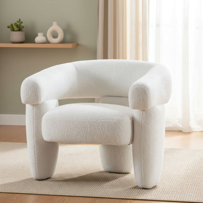 Cream-White Medieval-Style Modern Bucket Armchair. Soft And Skin-Friendly Lambswool Fabric. Round, Plush Cushions Provide A Wrap-Around Seating Experience. Simple, Elegant, And Stylish – A Piece For Relaxing At Home.