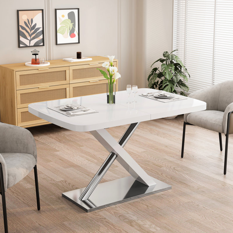 Table de salle à manger extensible 47,25 po - 63 po moderne blanc brillant pour 4 à 6 personnes, avec base en métal croisée et tubes en acier inoxydable, en blanc, base en forme de X, construction
