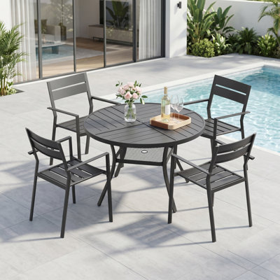 4-Person Round Patio Dining Set With Stackable Chairs
