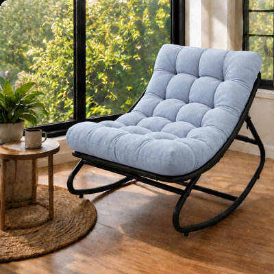 Fauteuil à bascule ergonomique avec coussin épais et structure métallique robuste, pour une utilisation intérieure et extérieure couverte, gris foncé.