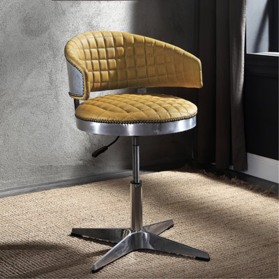 Tabouret en cuir souple rembourré de couleur curcuma, avec cadre et pivot pivotant confortable en métal