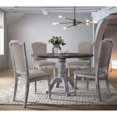 Ensembles de table à manger cinq pièces pour les salles à manger compactes, idéaux pour les maisons modernes avec des caractéristiques d'économie d'espace et de confort.