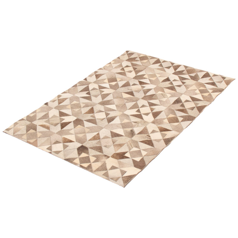 Tapis gris / ivoire / brun en cuir de vache fabriqué à la main Louden