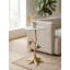 Table d'appoint décorative à motif de branches feuillues, piètement en aluminium doré et plateau rond en marbre blanc, de style organique, idéale pour la décoration du salon.