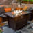 Beth 25" H x 42'' W Outdoor Propane Fire Pit Table with Glass wind guard, lid and Hideaway Gas Tank Seat, 50,000 BTU with Marble Tabletop, Wicker Base