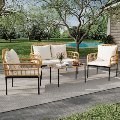 Ensemble de mobilier d'extérieur 4 pièces, causeuse et chaises en osier de rotin toutes saisons avec table basse en verre et structure en acier, ensemble de conversation Boho