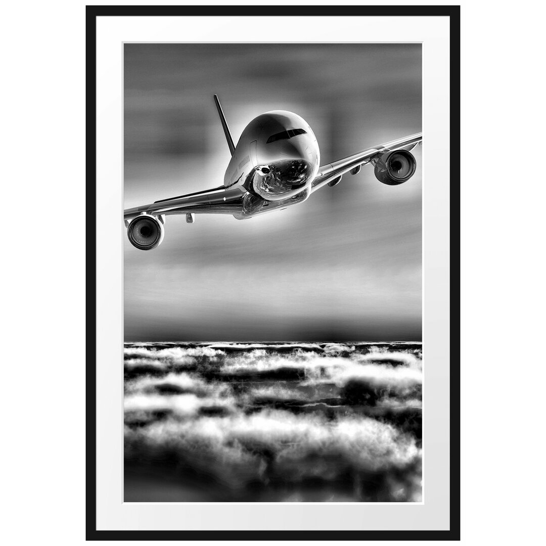 Gerahmtes Poster Flugzeug über den Wolken