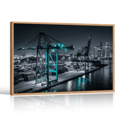 Grues industrielles avec lumières cyan la nuit, tableau sur toile