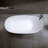 57″Solid Surface Matte Tub, Solid Surface Soaking Tub, Stone Resin Freestanding Bathtub, Thick Edge Stand Alone Tubs With Overflow, Pop-Up Drain, Matte White (Oval)