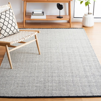 Tapis géométrique noir / ivoire en coton tissé à la main Vermont