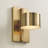 5.5" W x 10" H Integrated LED Dual Sconce in Aged Brass with Up and Down Cylinder Lights